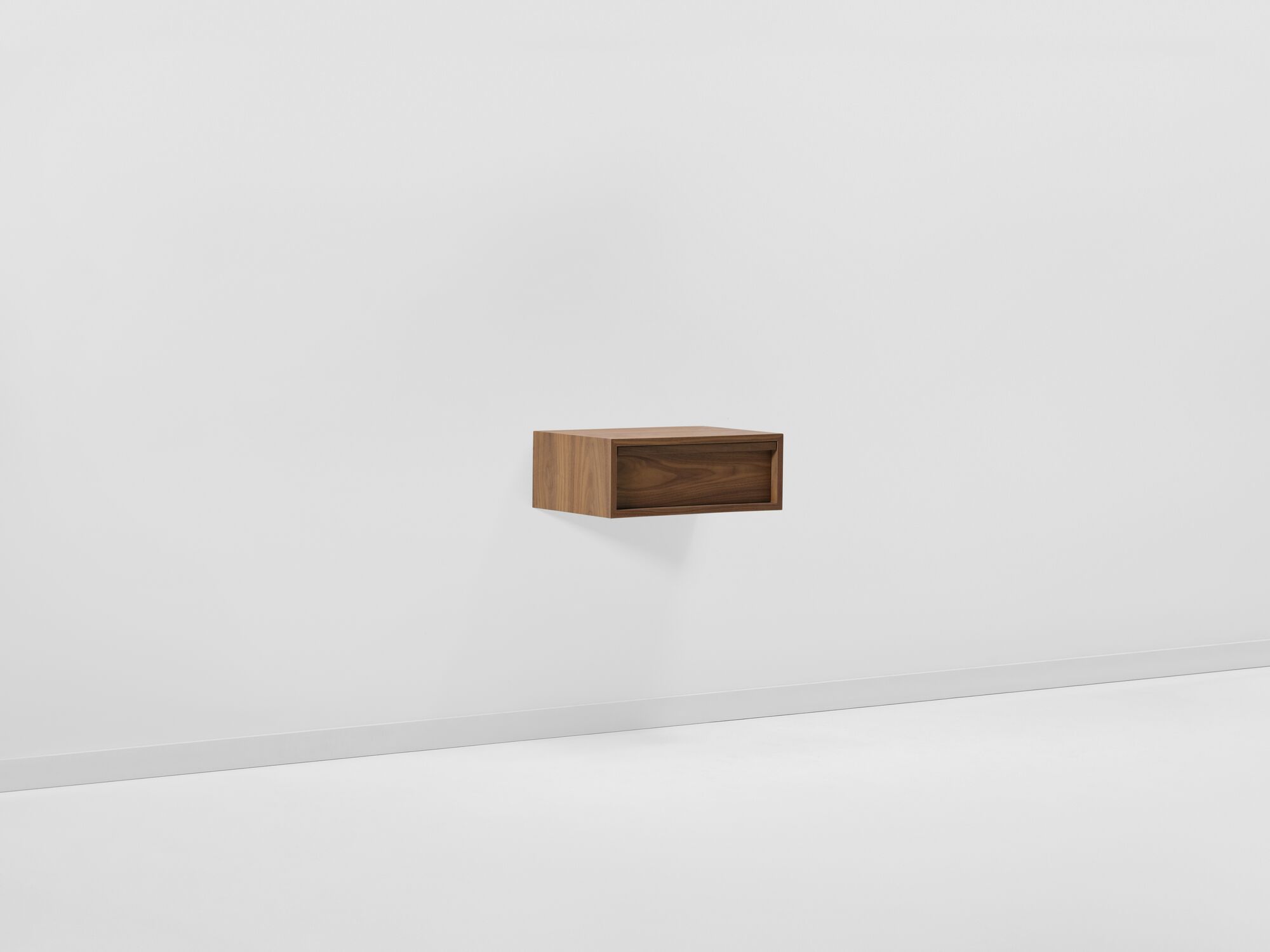 Modern walnut floating nightstand front angle view